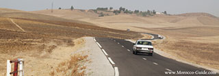 White taxi in Moroccan national road..